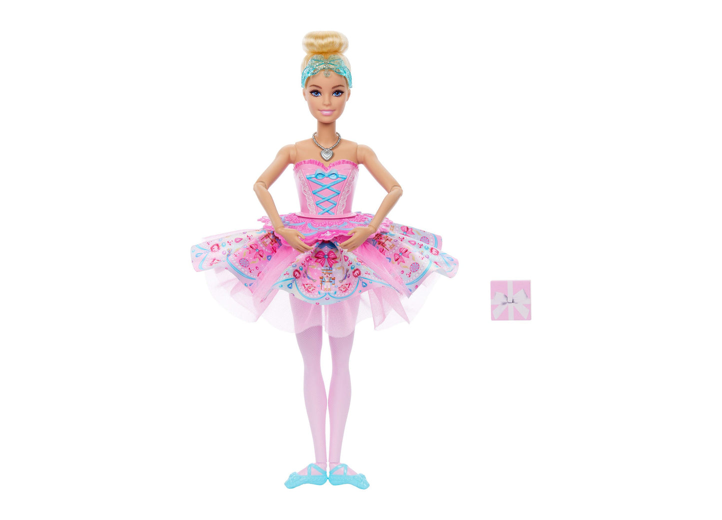 Barbie in the Nutcracker Clara doll wearing pink tutu ballet dress with blue accents