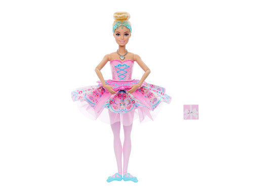 Barbie in the Nutcracker Clara doll wearing pink tutu ballet dress with blue accents