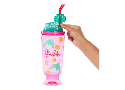 Barbie Pop Reveal Sea Slushy doll with teal shell-shaped top and pink body featuring dolphin and seashell designs