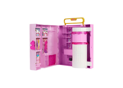 Barbie Deluxe Style Closet playset in pink and white with spin-style feature, storage shelves, and gold carry handle