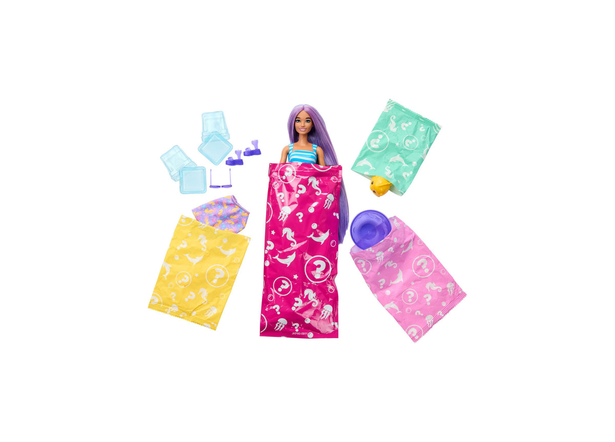 Barbie Pop Reveal Sea Slushy doll with purple hair in blue top, surrounded by colorful pop-open ice cubes, slime cup,...