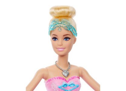 Barbie Nutcracker Clara doll with blonde hair, blue tiara, pink tutu dress, and heart necklace