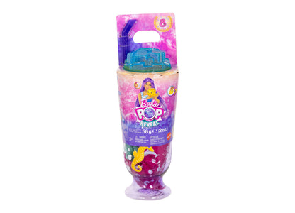Barbie Pop Reveal Sea Slushy doll in purple packaging with blue dome container and pink slime cup