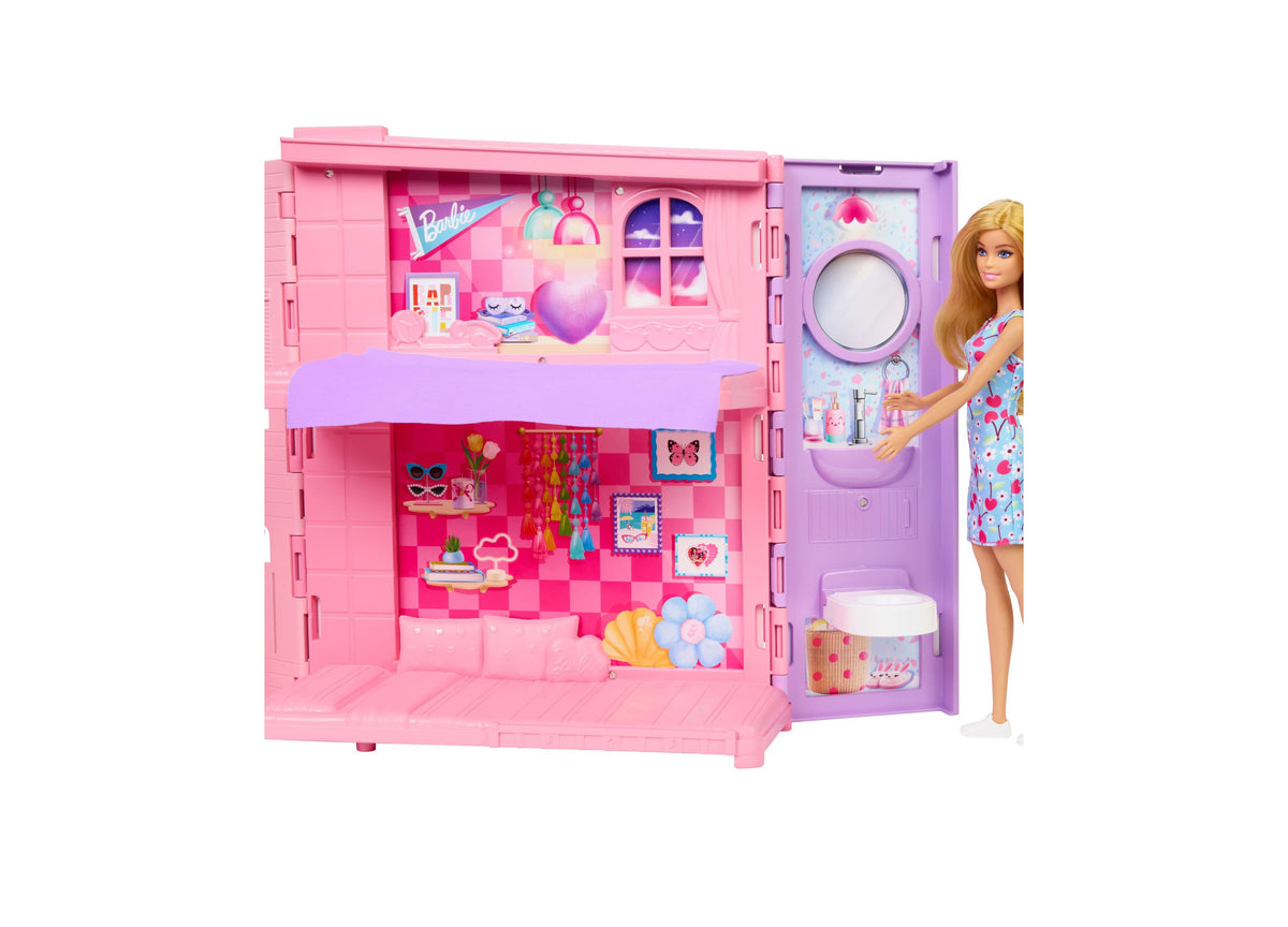 Barbie Weekend Escape Foldable Dollhouse with four pink and purple play areas, Barbie doll, and accessories including...