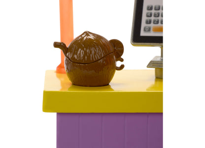 Barbie beach shack snack stand playset with brown spherical snack container on yellow shelf