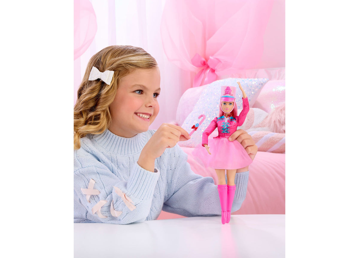 Barbie in the Nutcracker Daisy ballerina doll in pink outfit with hat and candy cane baton