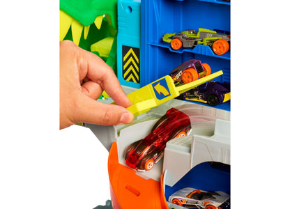 Hot Wheels T-Rex Garage Playset with colorful storage tower and die-cast cars