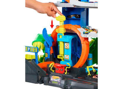 Hot Wheels Ultimate T-Rex Garage Playset with colorful orange and blue track set