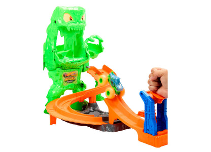 Hot Wheels Mutant Monster Takedown Playset with green monster head, orange track, and blue launcher