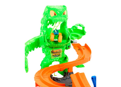 Hot Wheels Mutant Monster Takedown Playset featuring green monster with orange track and small vehicle