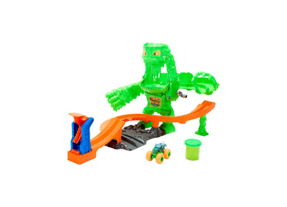 Hot Wheels Mutant Monster Takedown Playset with green monster truck, orange track ramp, and small vehicle