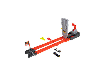 Hot Wheels 1:64 Scale Formula 1 Grid Start Track Set with red track, gray launcher, and two die-cast cars