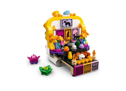 LEGO Día De Los Muertos Altar of the Dead 40811 building set with yellow, purple, and pink pieces featuring decorativ...