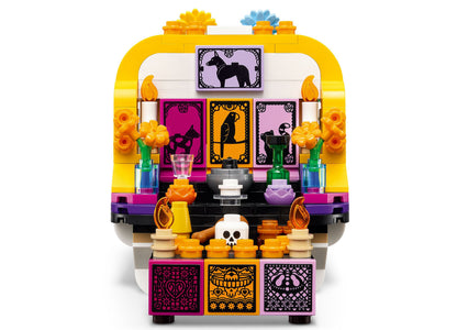 LEGO Día De Los Muertos Altar of the Dead 40811 building set with colorful yellow, pink, and purple pieces featuring ...