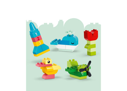 LEGO DUPLO Classic Colorful Creative Box 10479 with colorful building blocks including rocket, whale, flower, duck, a...