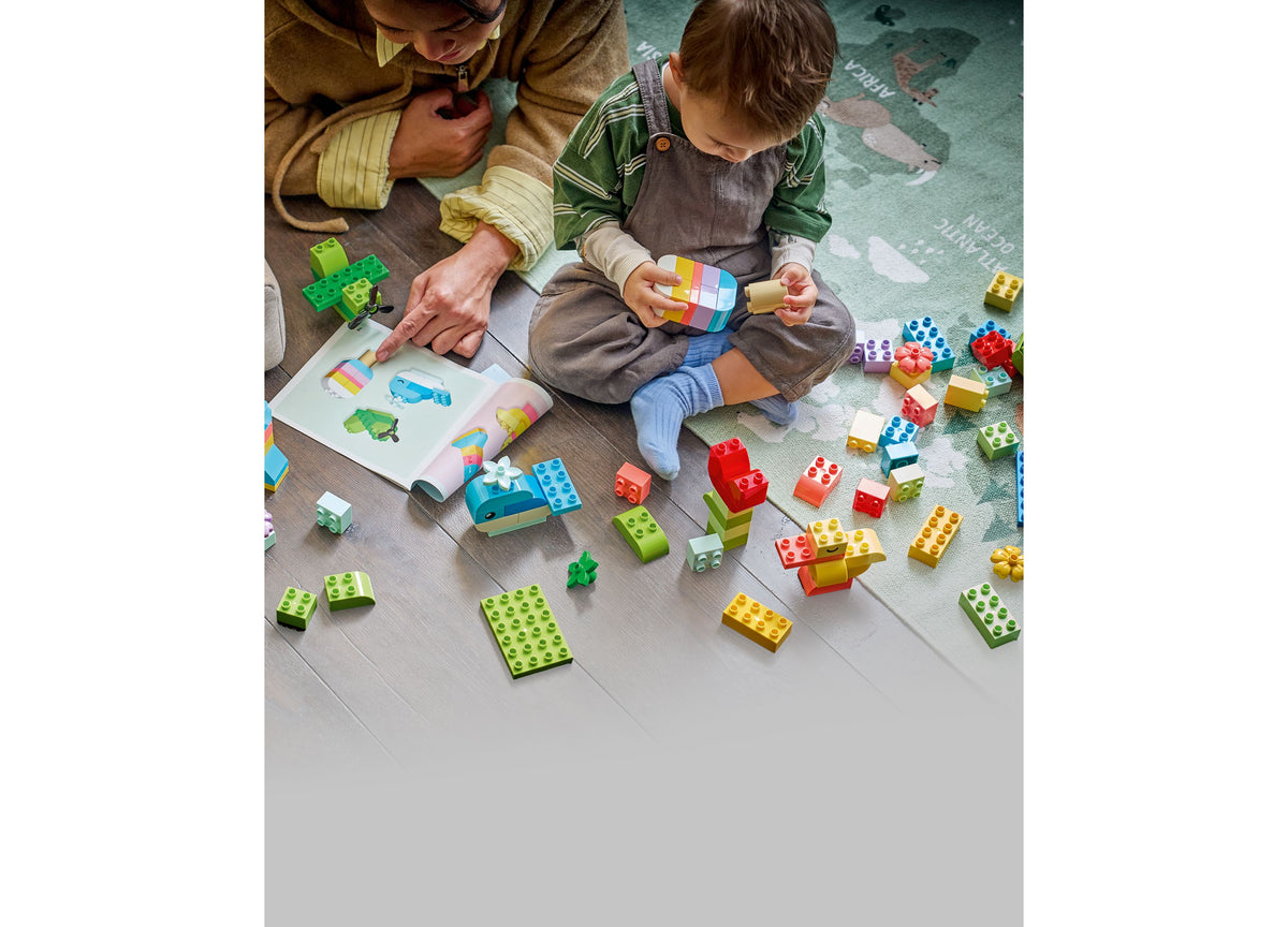LEGO DUPLO Classic Colorful Creative Box with adult and toddler playing with colorful bricks