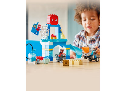 LEGO Marvel Team Spidey Webquarters 10464 building set with blue headquarters, red Spider-Man figure, and vehicles