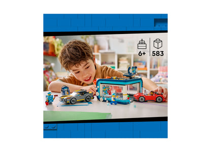 LEGO City Drive-Through Car Wash 60497 set with 583 pieces, featuring blue car wash building, red and black cars, and...
