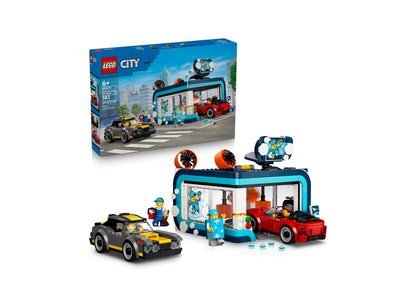 LEGO City Drive-Through Car Wash 60497 building set with yellow and red cars, blue wash station, and minifigures