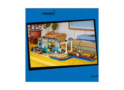 LEGO City Classic Beach Streetcar 60506 set with blue and yellow train, station, and minifigures on display