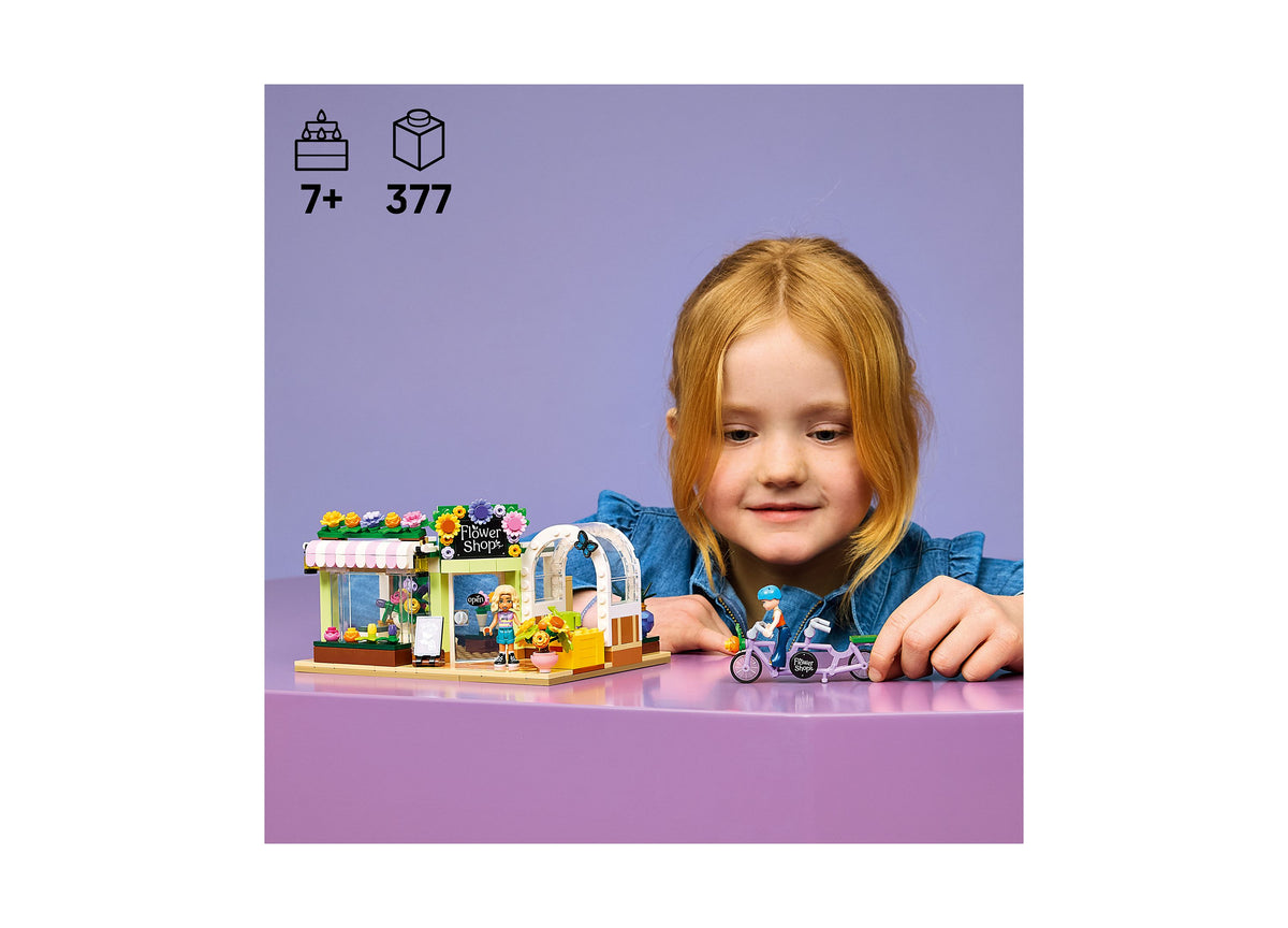 LEGO Friends Creative Flower Shop 42693 building set with 377 pieces for ages 7+, featuring colorful flower displays ...