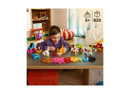 LEGO Classic Creative Colorful Bricks 11045 set with 820 pieces in multiple colors being built by child
