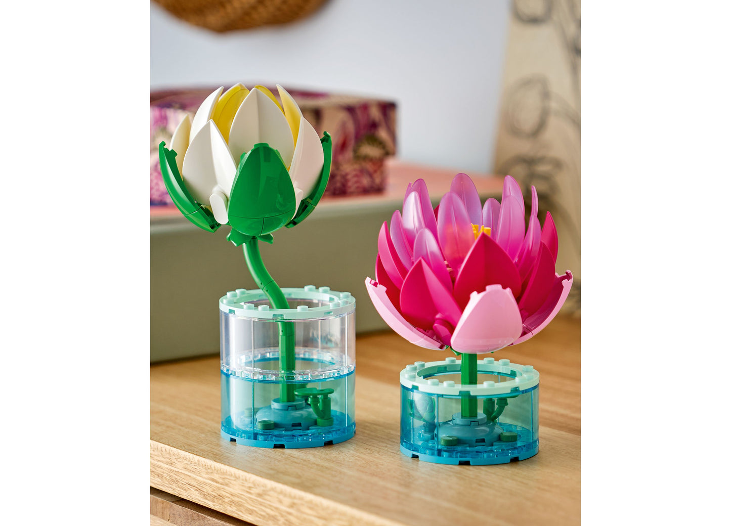 LEGO Botanicals Water Lilies building set with white and pink flower models in blue water bases