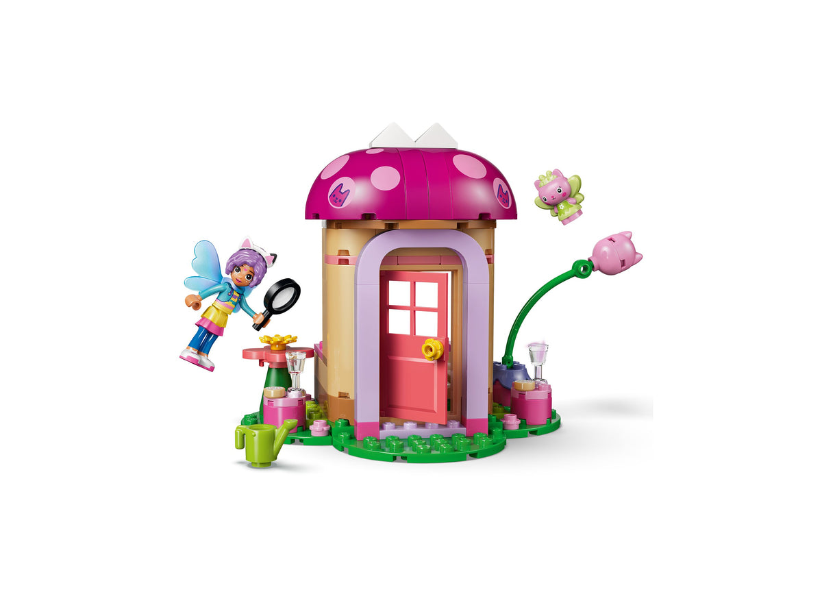 LEGO Gabby's Dollhouse Kitty Fairy's Garden House building set with pink mushroom roof, fairy character, and colorful...