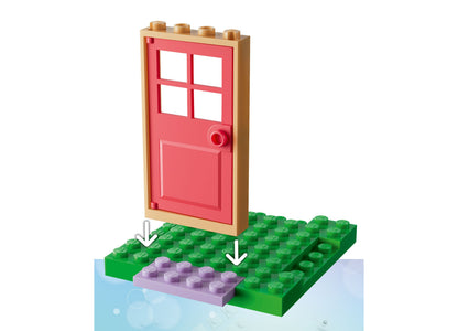 LEGO Gabby's Dollhouse Kitty Fairy's Garden House with red door and green base building set