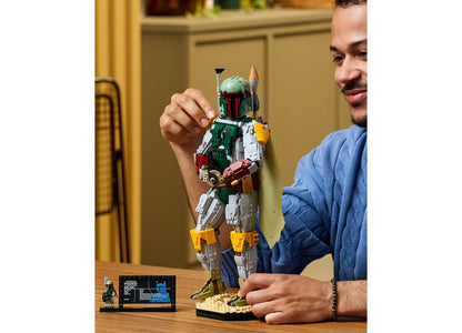 LEGO Star Wars Boba Fett 75455 buildable figure with green, white, and yellow armor displayed by adult