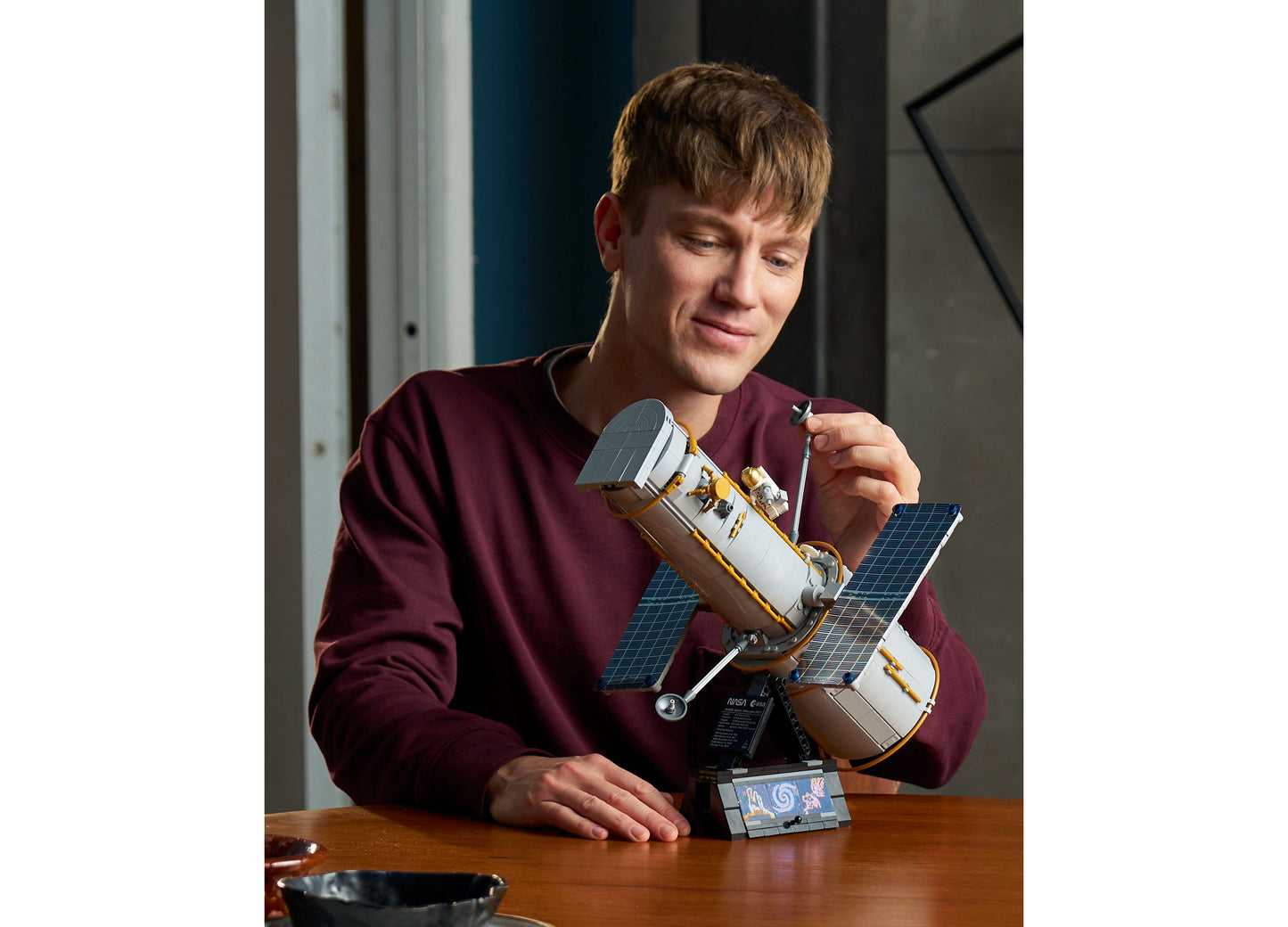LEGO Icons Hubble Space Telescope 11382 building set with solar panels and detailed white and gold components