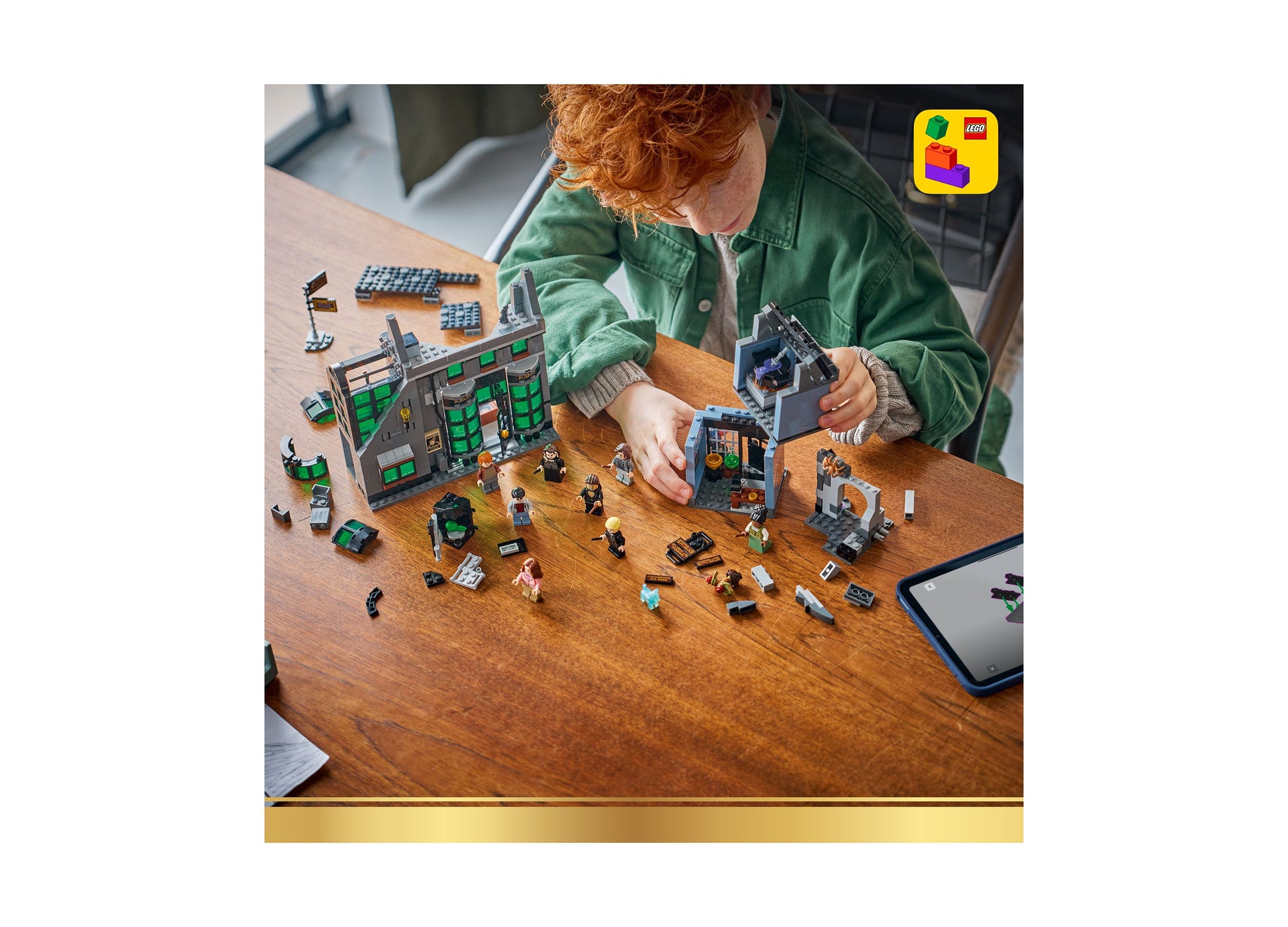 Child playing with LEGO Harry Potter Knockturn Alley Wizarding Shops set featuring detailed building with minifigures