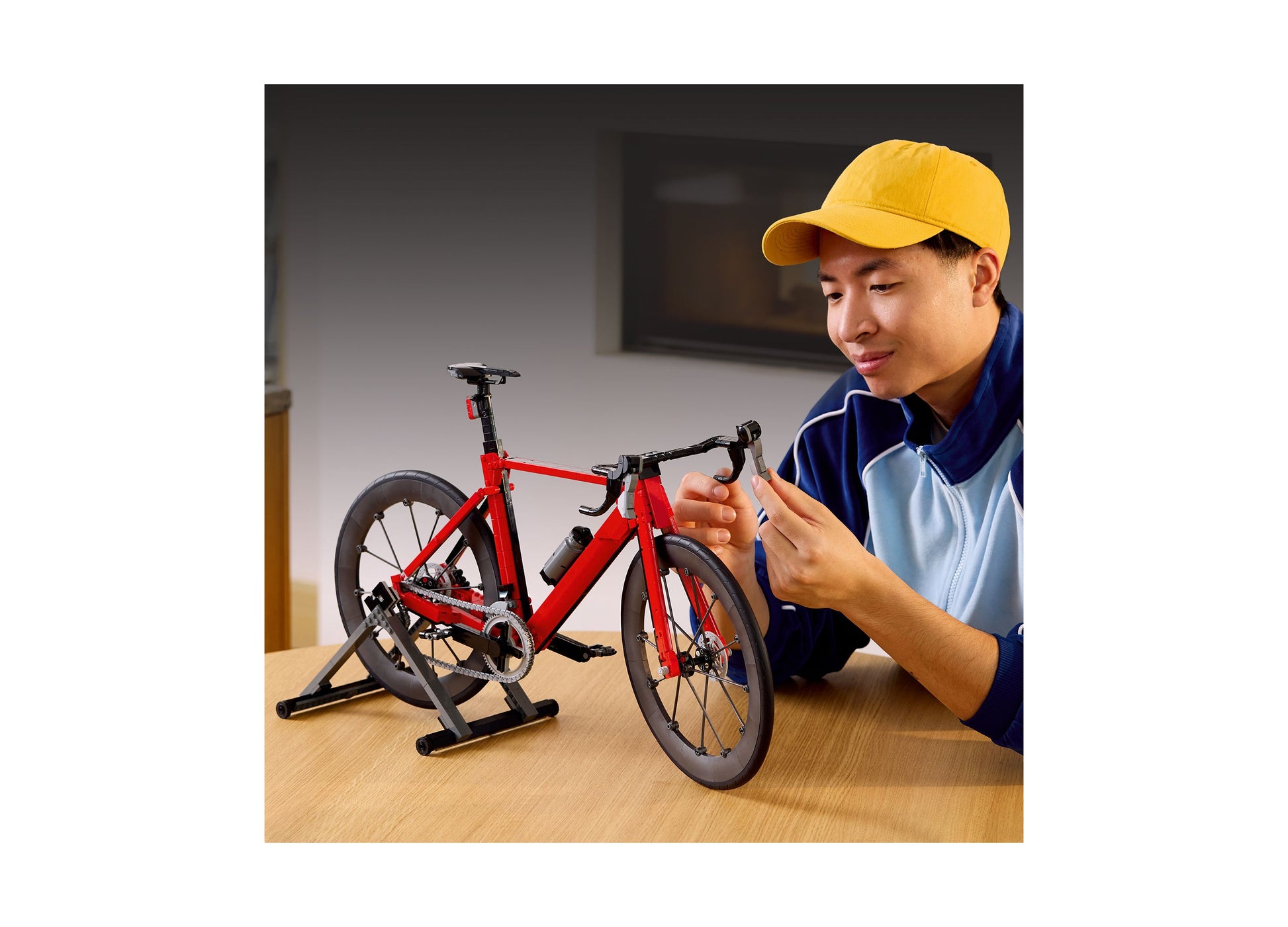 LEGO Icons Road Bike 11380 red detailed building set displayed on wooden table