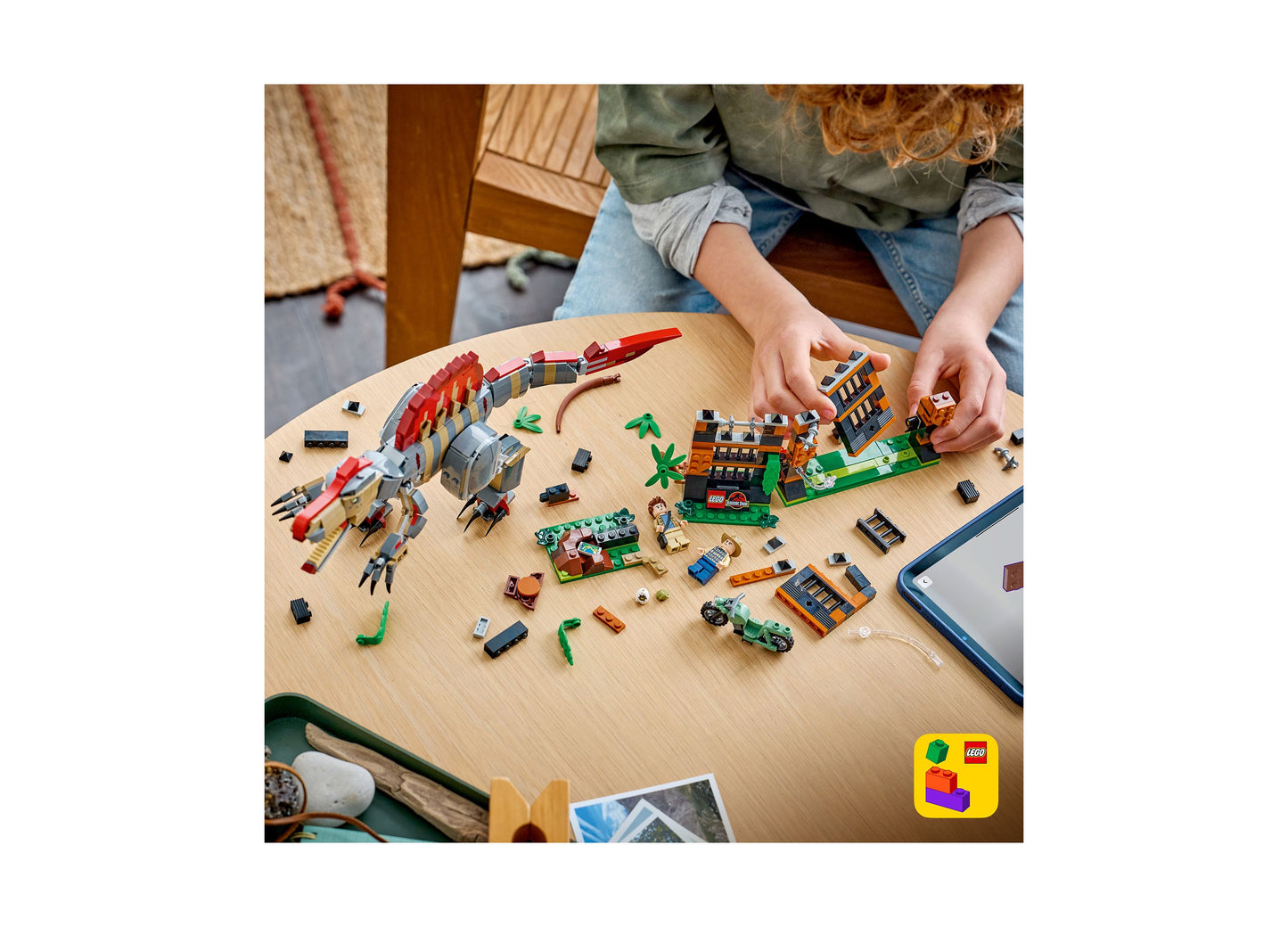 LEGO Jurassic World Spinosaurus Dinosaur Escape 77982 set with red dinosaur, buildings, and minifigures displayed on ...