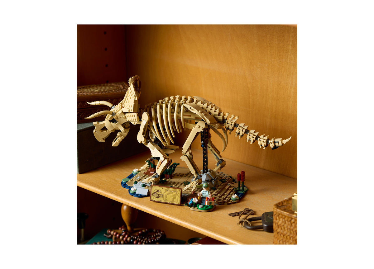 LEGO Jurassic World Triceratops 77985 fossil skeleton building set displayed on stand with minifigure and scene acces...
