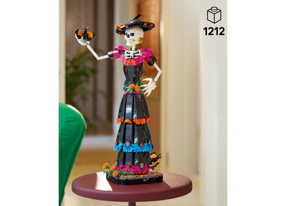 LEGO Ideas Day of the Dead La Catrina skeleton figure with poseable arms, colorful marigold decorations, and mo...