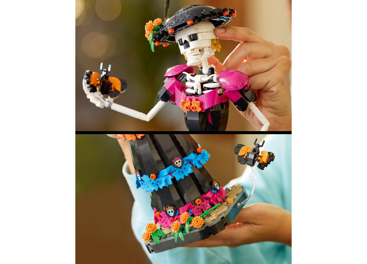 LEGO Ideas Day of the Dead La Catrina building set with poseable skeleton figure, colorful marigolds, and monarch but...