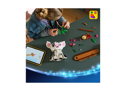 LEGO Disney Moana Pua 43292 building set with pink and white pig figure, green leaves, and accessories on display table