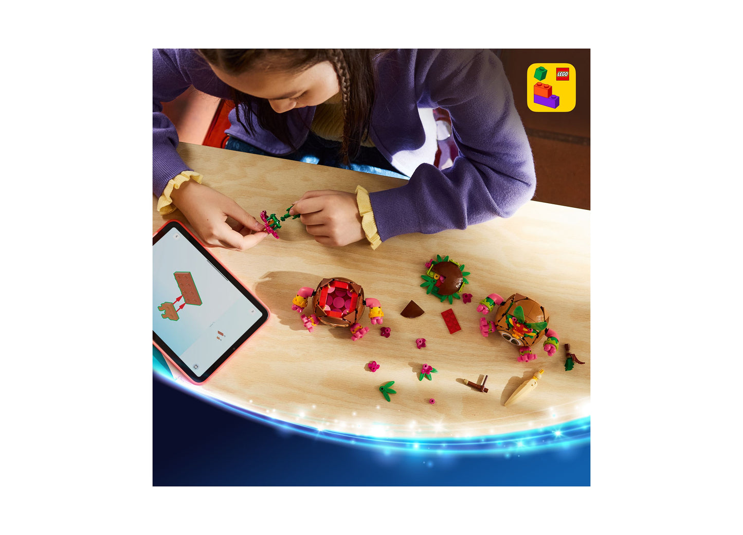 LEGO Disney Moana Kakamora 43293 building set with colorful flower pieces, shown being built by child