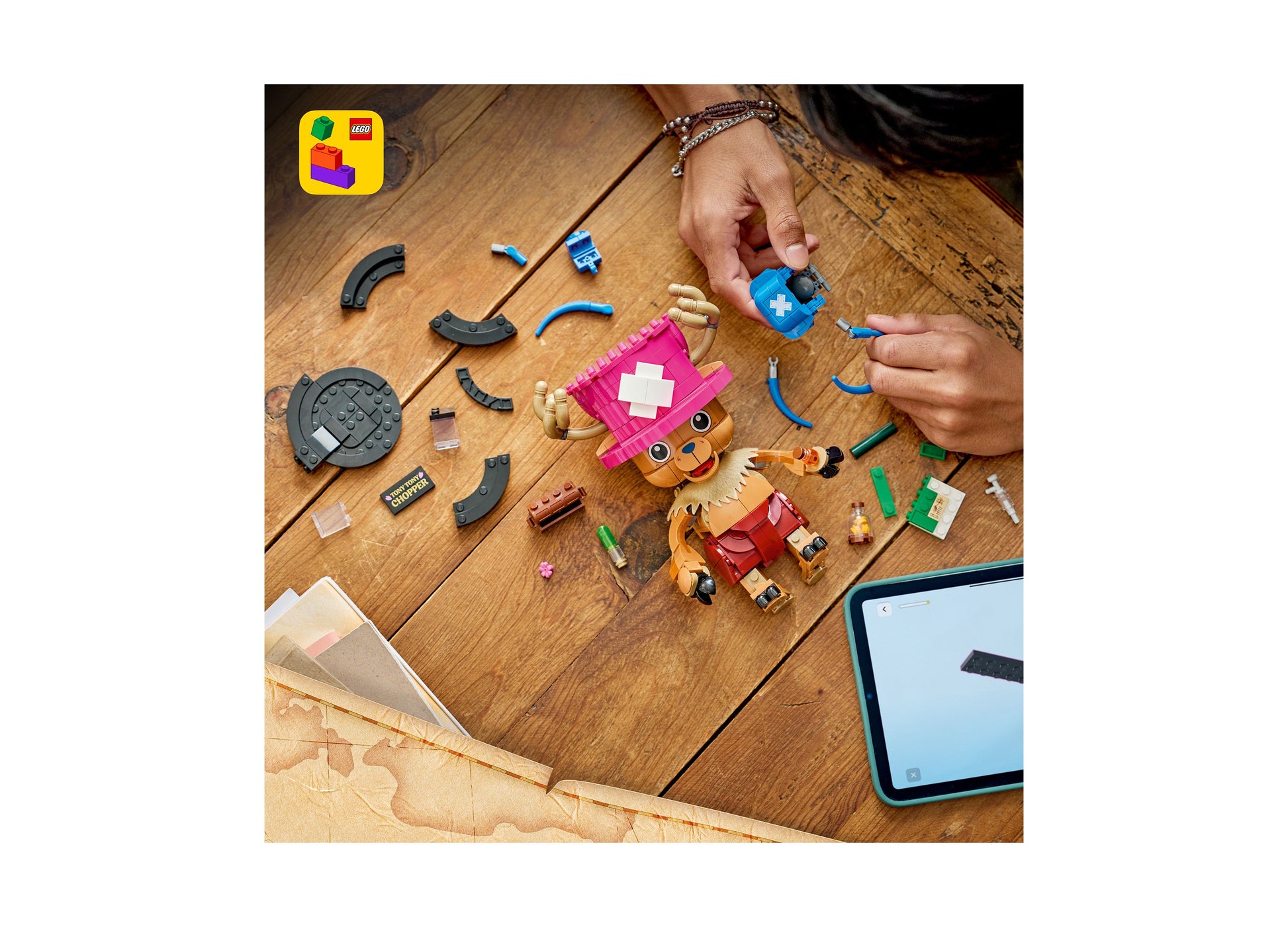 LEGO ONE PIECE Tony Tony Chopper 75643 building set with pink, orange and blue pieces displayed on wooden surface