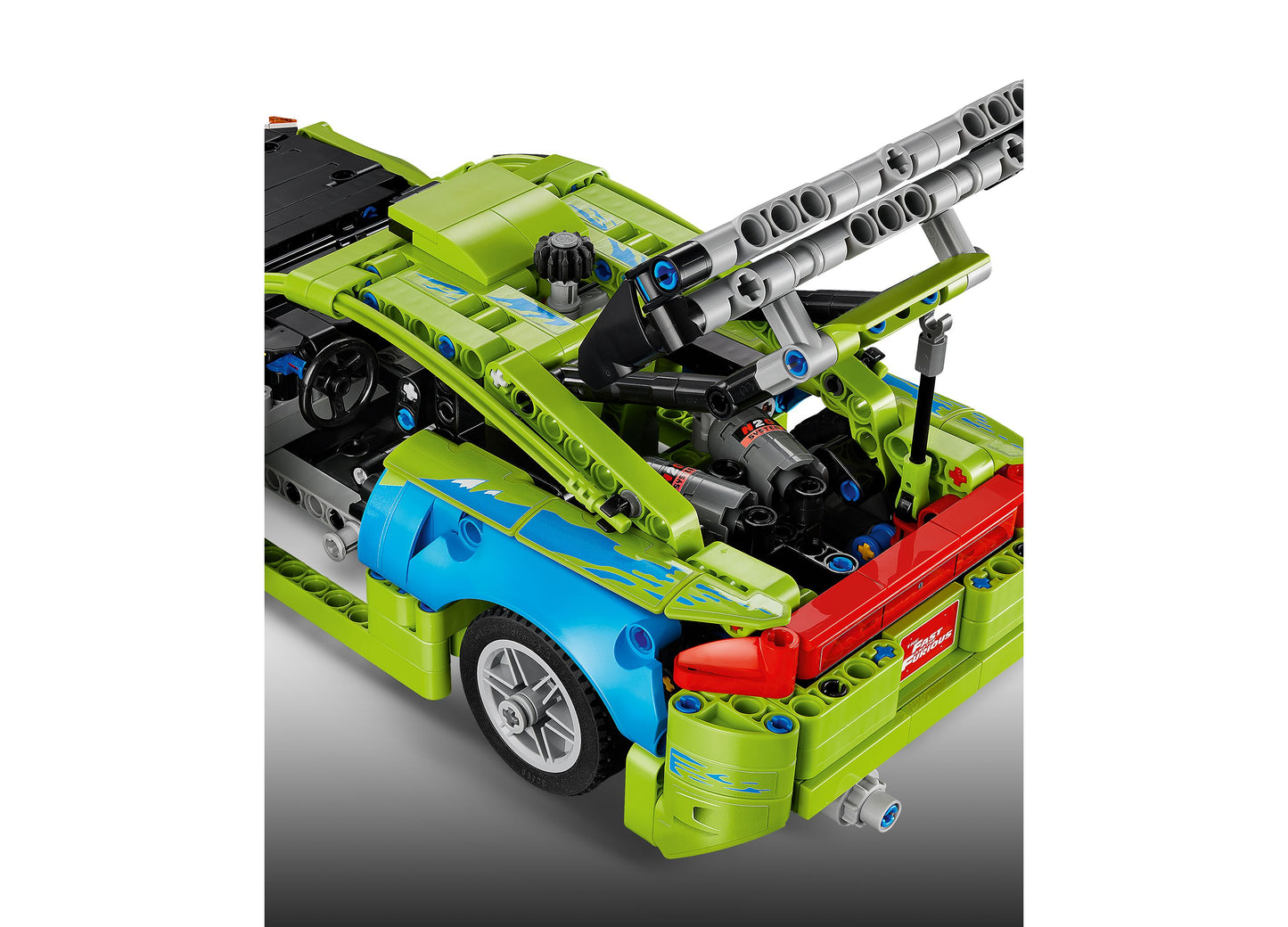 LEGO Fast and Furious Mitsubishi Eclipse 42229 building set with lime green truck and blue car