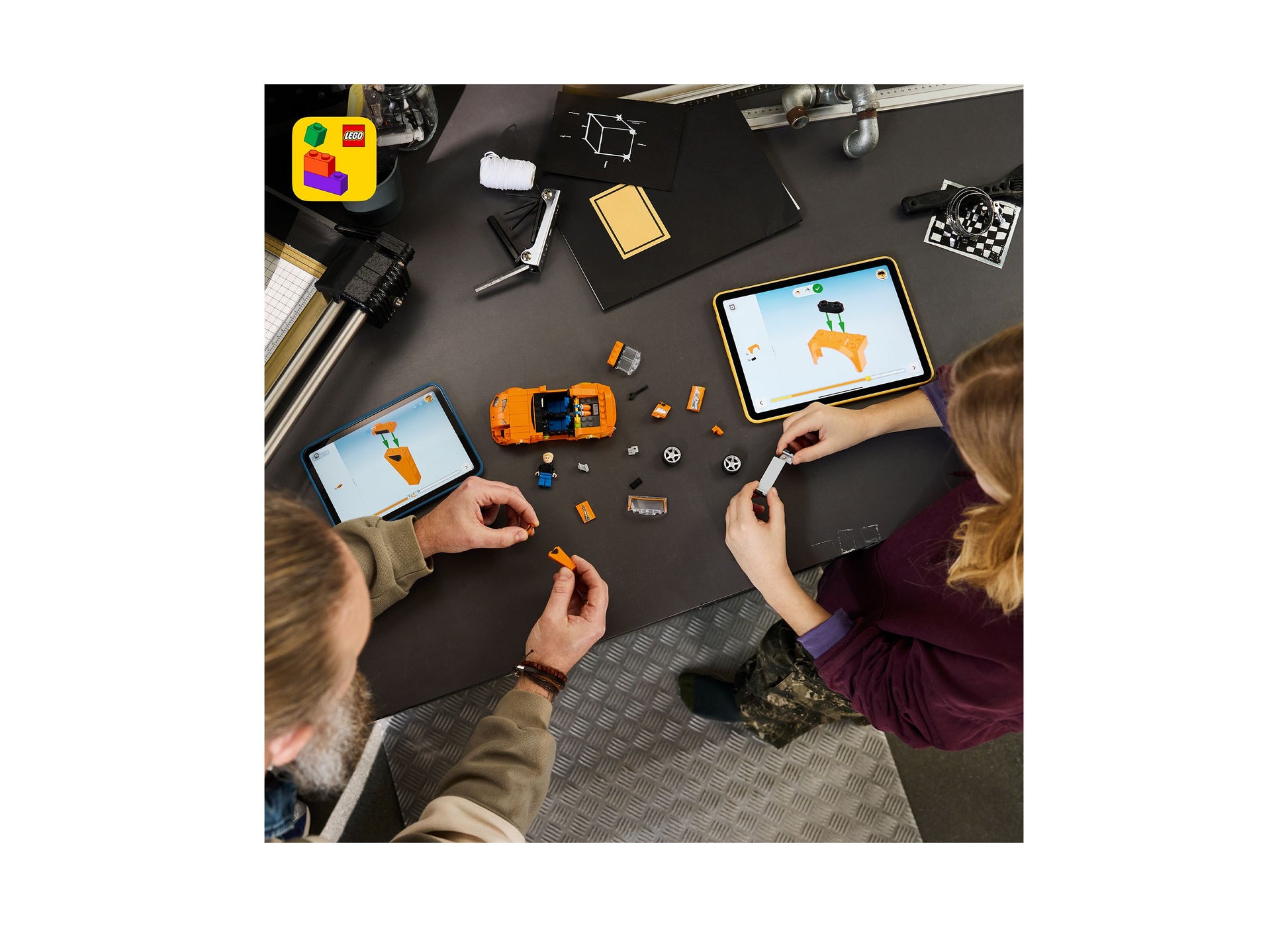 LEGO Fast and Furious Toyota Supra MK4 building set with orange car, displayed on tablet screens during interactive p...