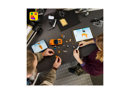 LEGO Fast and Furious Toyota Supra MK4 building set with orange car, displayed on tablet screens during interactive p...