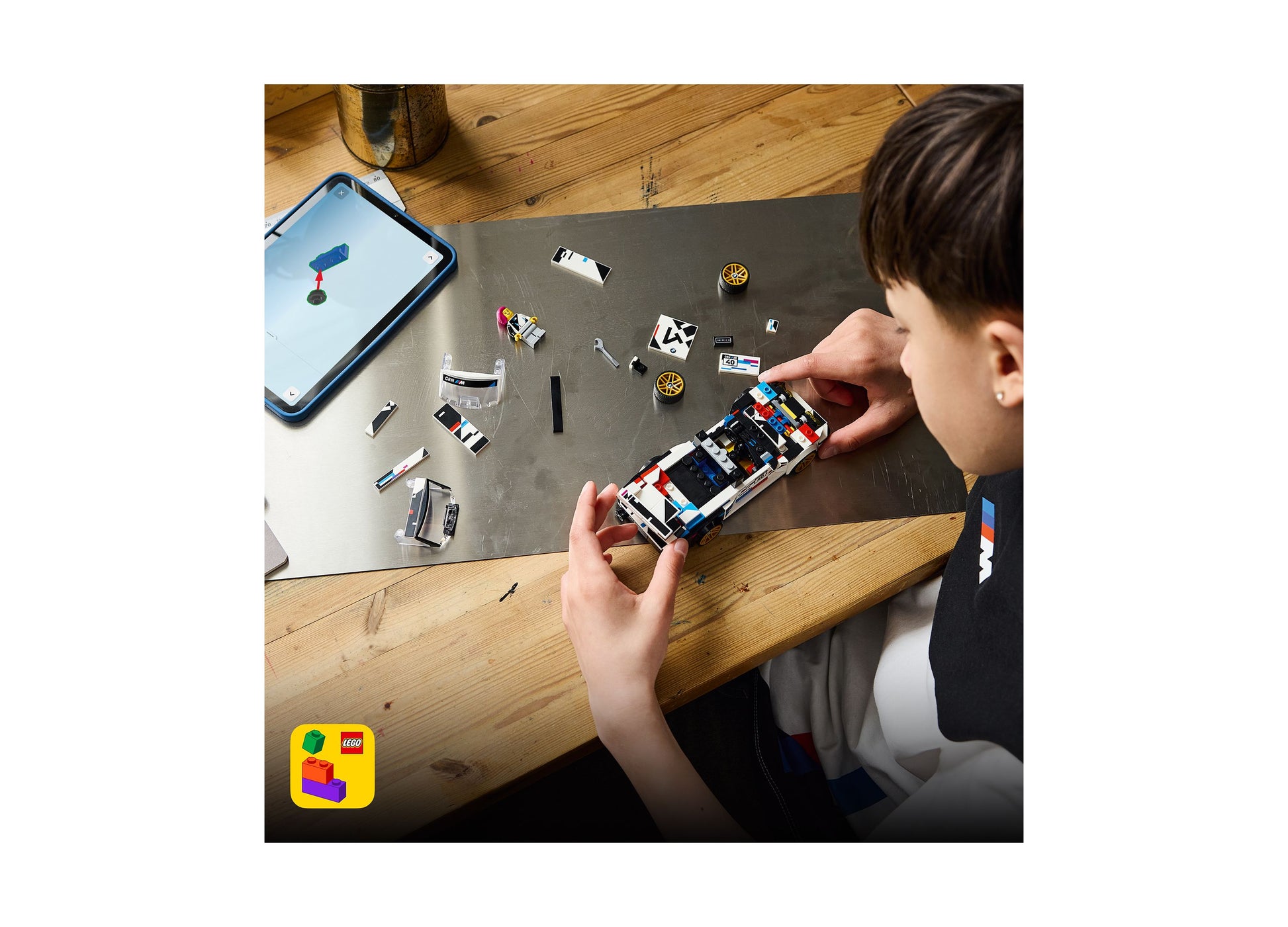 LEGO BMW M3 E30 77263 building set with 358 pieces, displayed assembled in child's hands