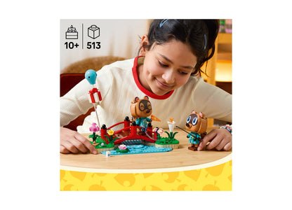 Child playing with LEGO Animal Crossing Timmy Tommy's Fun Day Out set featuring colorful animal characters and garden...