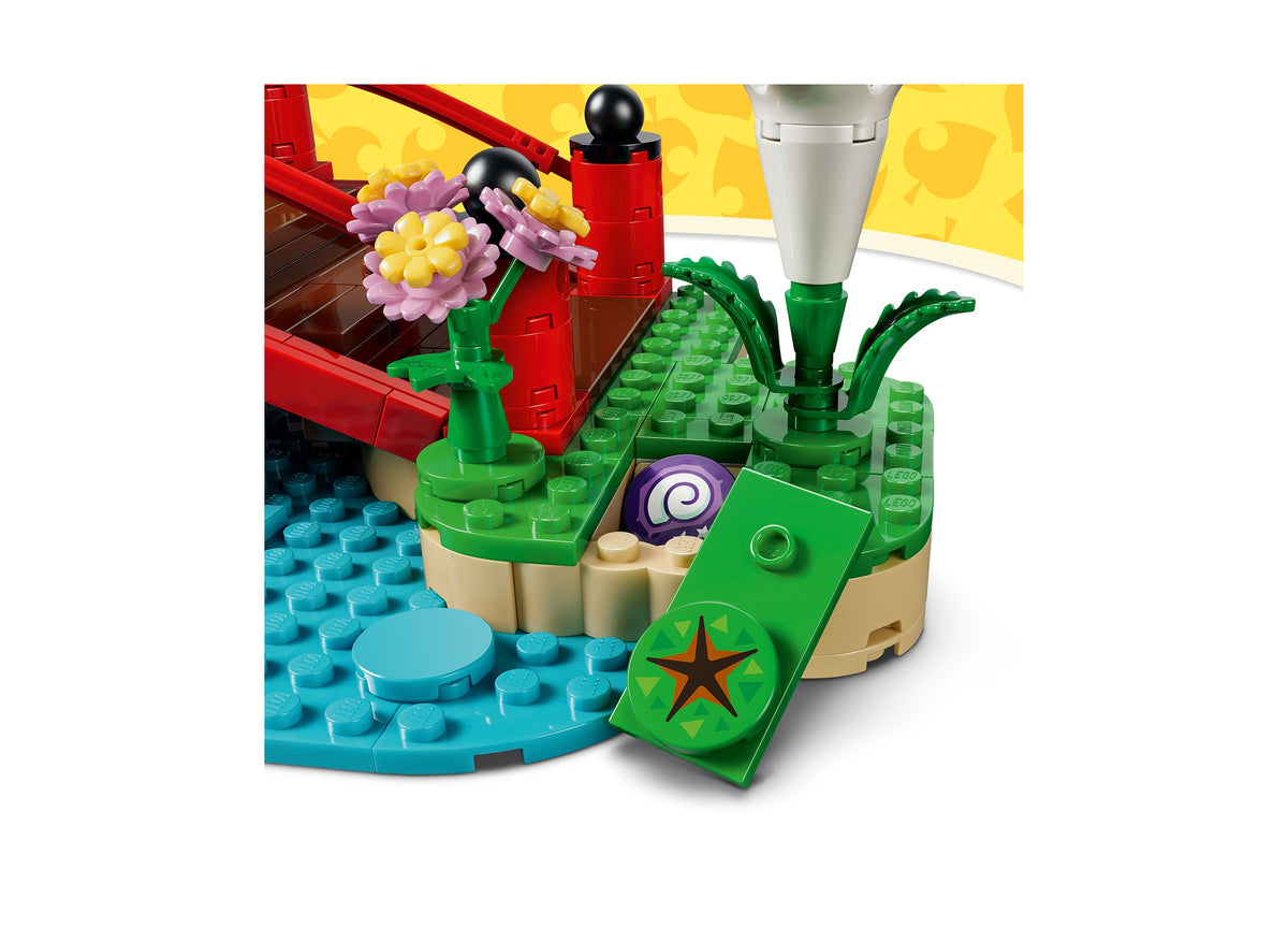 LEGO Animal Crossing Timmy Tommy's Fun Day Out set with colorful green, blue, red and yellow pieces including flowers...