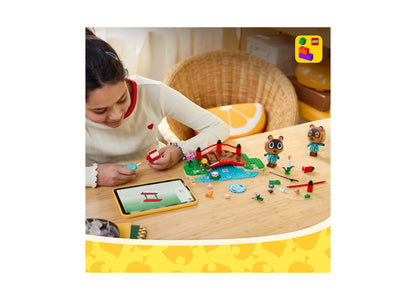 LEGO Animal Crossing Timmy Tommy's Fun Day Out set with animal figures, red bridge, and accessories on wooden table