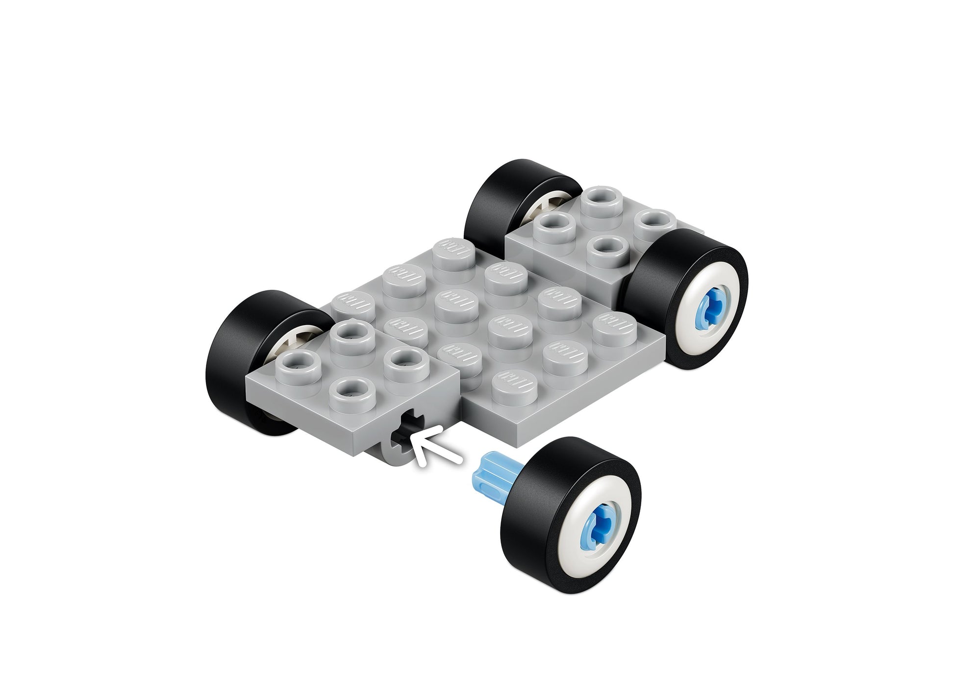 LEGO Bluey 11216 building set with gray baseplate, black wheels, and blue accents