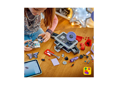 LEGO Olivia Rodrigo Secret Storage 43030 building set with purple and red pieces displayed on wooden table