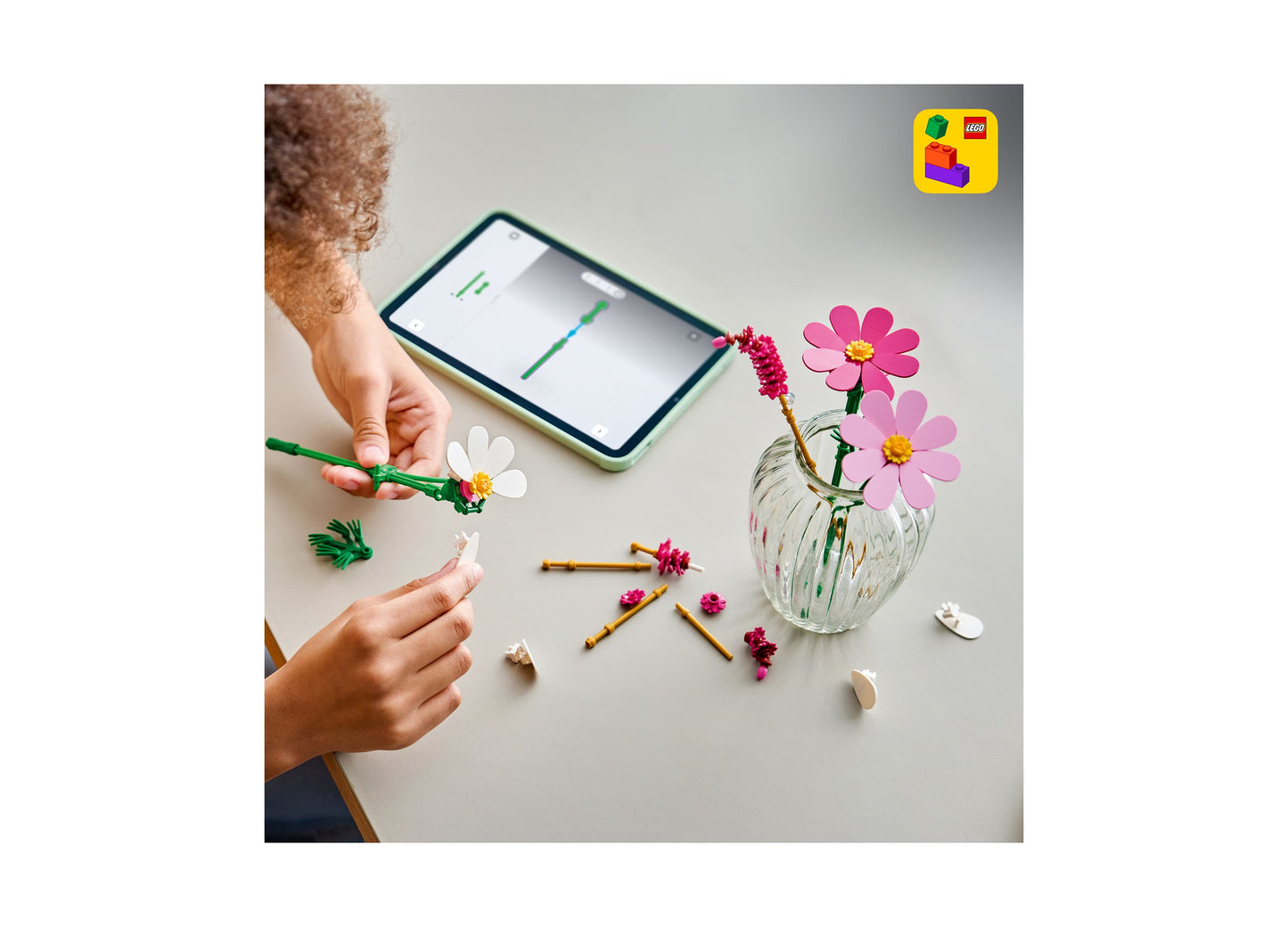LEGO Cosmos Flowers 11514 building set with pink and white flower pieces displayed in glass vase
